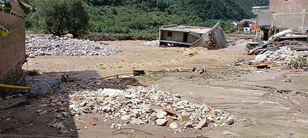 洪灾无情  烟草有爱 风雨同担 蓝田烟草助力商户灾后重建